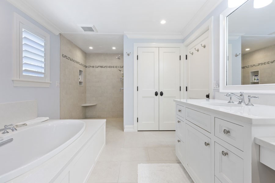 25 Oakdale Path Barnstable, MA 02655 - Photo 36 of 42 a spacious bathroom with double sink a large mirror and shower