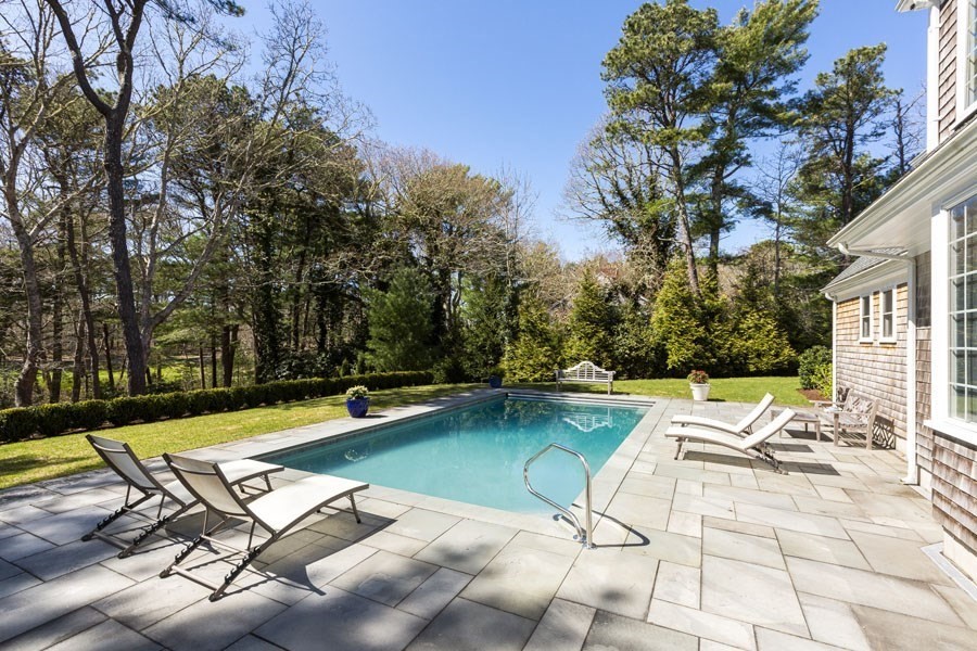 25 Oakdale Path Barnstable, MA 02655 - Photo 10 of 42 a view of swimming pool with lounge chairs