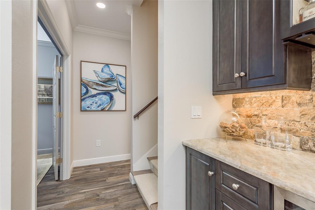 600 Reserve Court, Unit 600 Dunedin, FL 34698 - Photo 12 of 81 a bathroom with a granite countertop sink and a painting on the wall