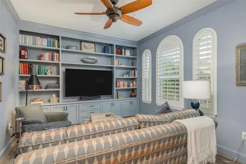 a bedroom with bed and window