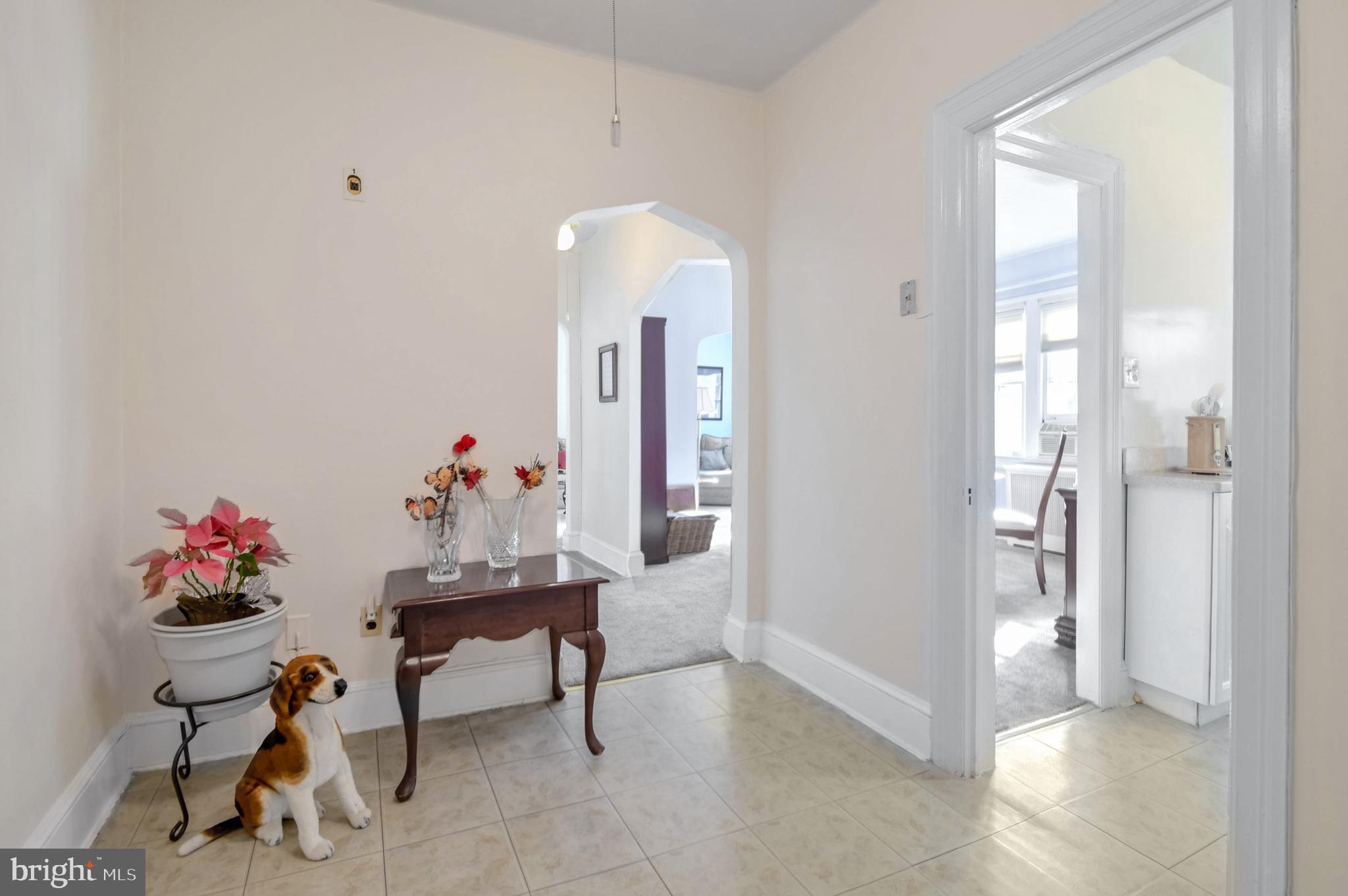 236 Farragut Street Northwest, Unit H203 Washington, DC 20011 - Photo 5 of 30 a living room with furniture and a chandelier