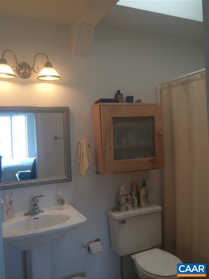 1227 Chatham Ridge Charlottesville, VA 22901 - Photo 11 of 14 a bathroom with a toilet sink and mirror