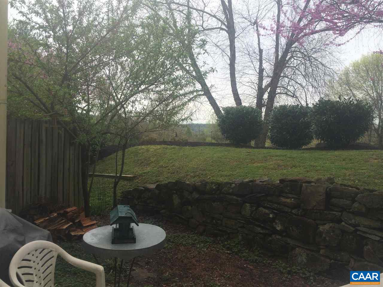 1227 Chatham Ridge Charlottesville, VA 22901 - Photo 8 of 14 a table and chairs in backyard of house
