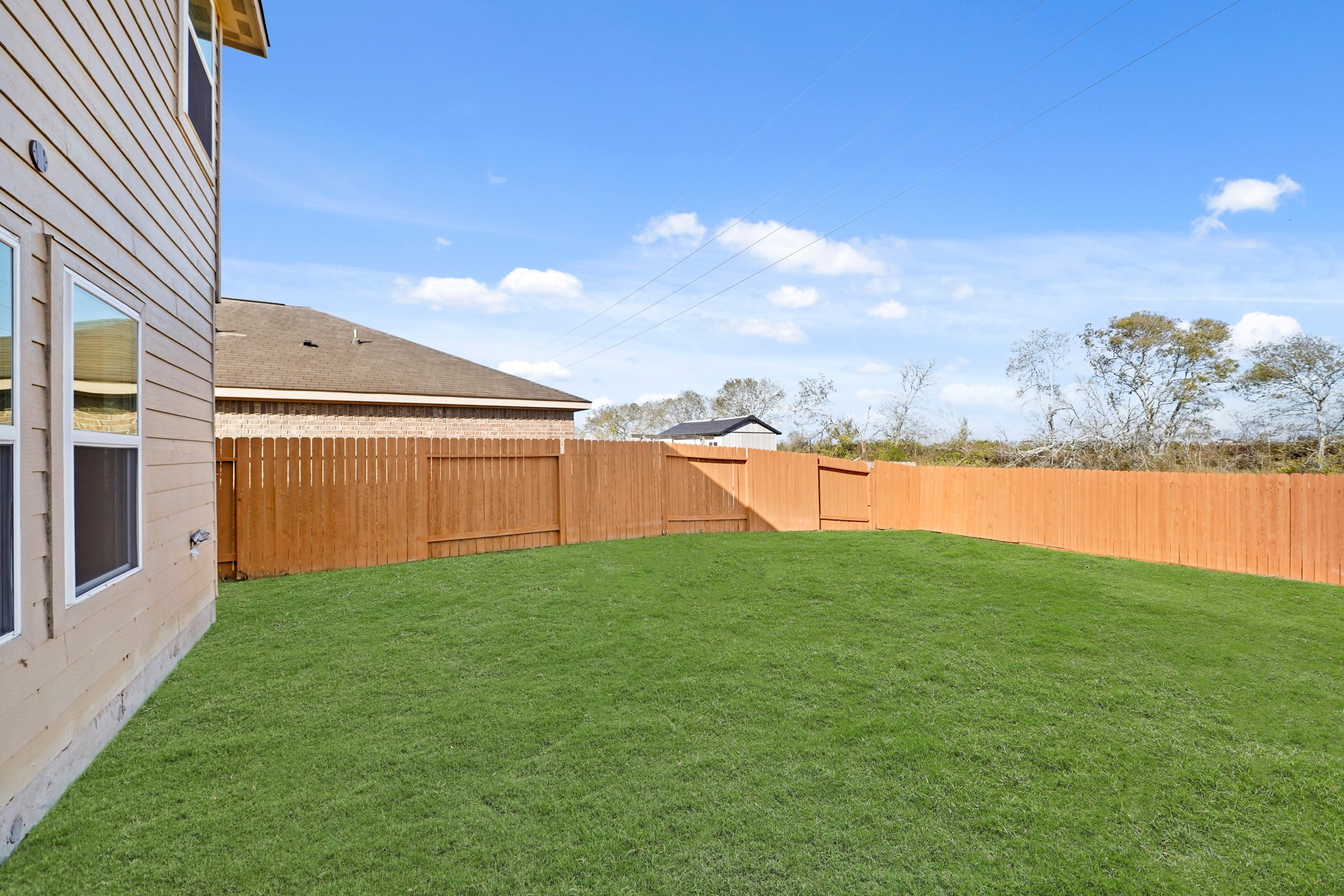 1531 Loose Stone Drive Rosharon, TX 77583 - Photo 18 of 18 This backyard features solid board fencing providing more privacy.