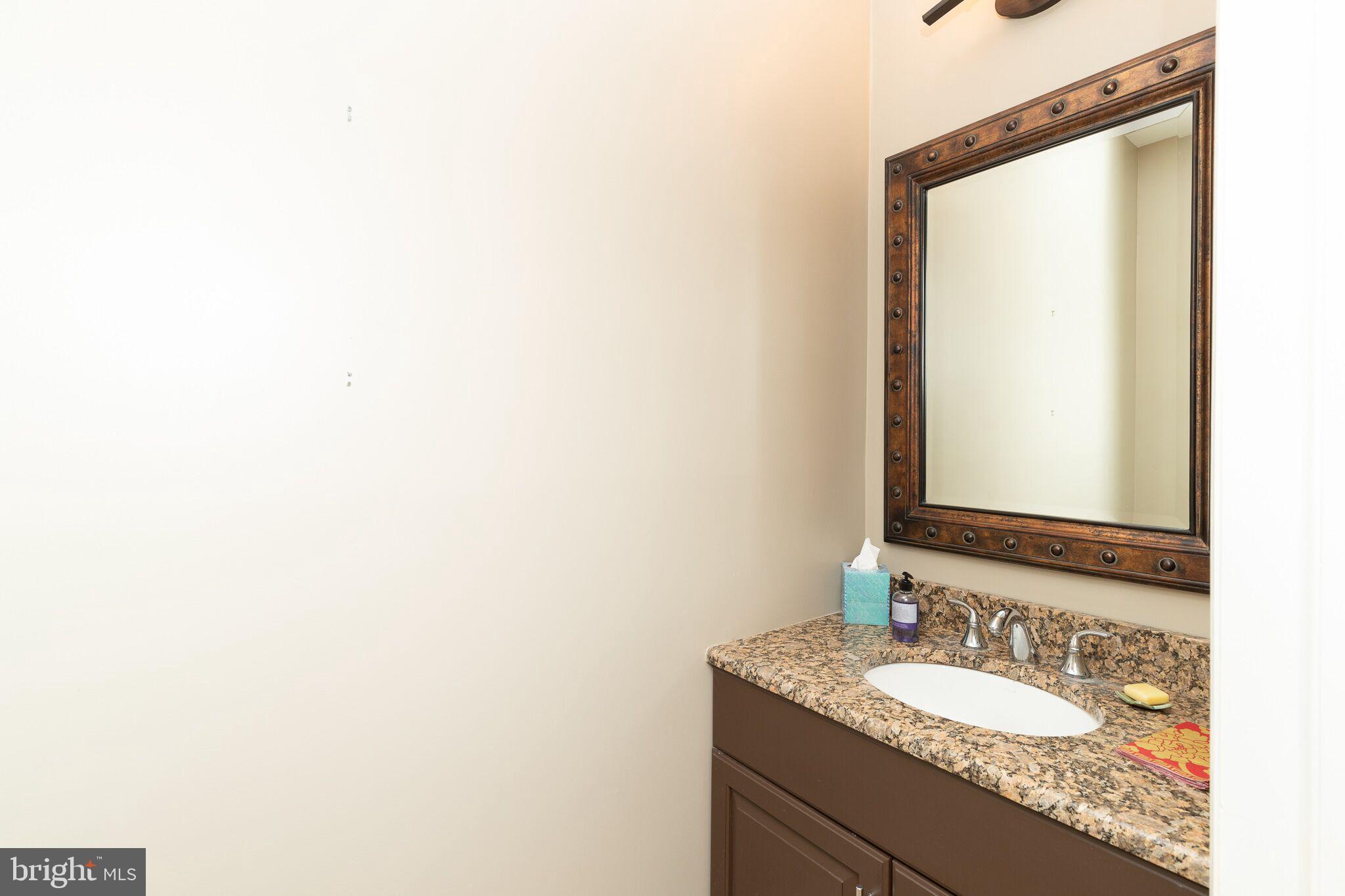 100 Indiantown Road Glenmoore, PA 19343 - Photo 10 of 33 Powder Room Accross From Laundry Room