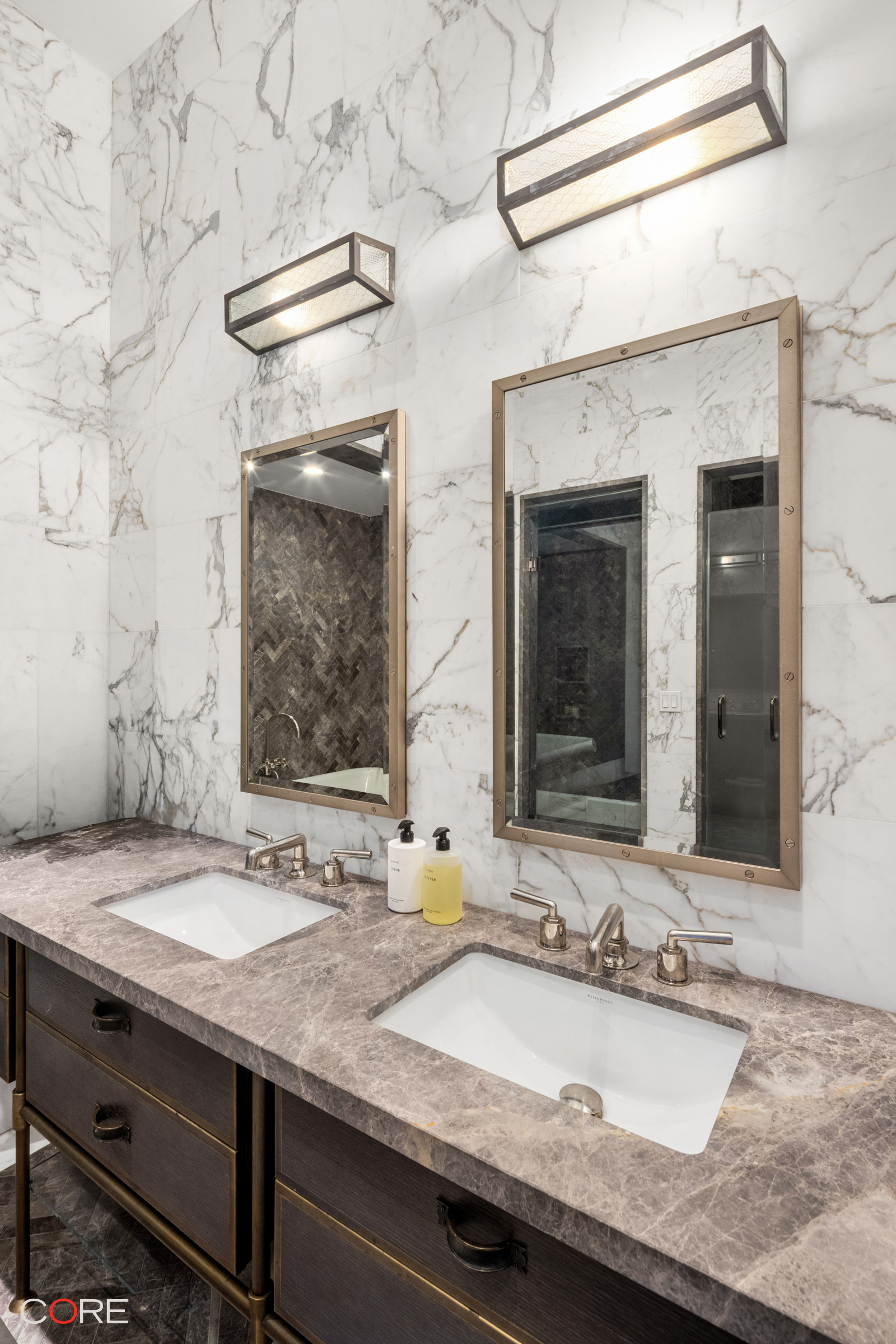87 Leonard Street, Unit PHB Manhattan, NY 10013 - Photo 13 of 16 a bathroom with a granite countertop sink and a mirror