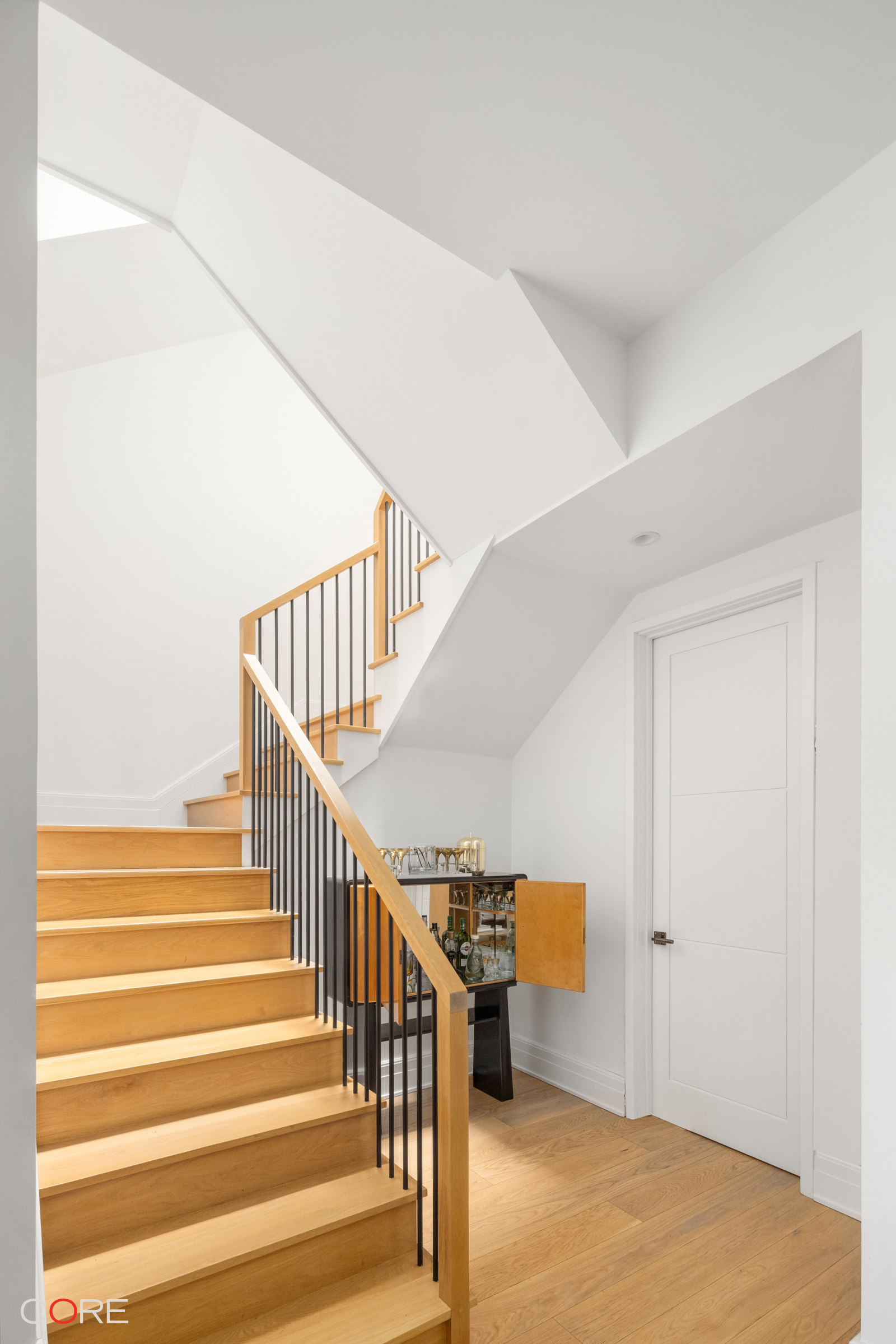 87 Leonard Street, Unit PHB Manhattan, NY 10013 - Photo 9 of 16 a view of staircase with white walls