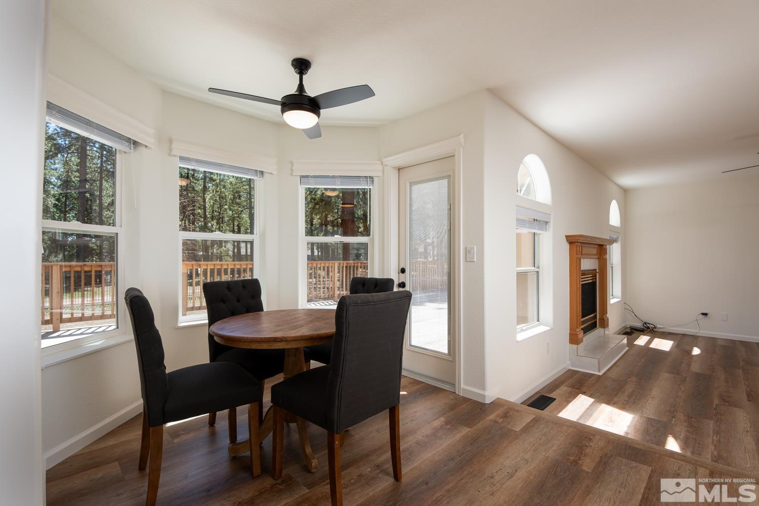 4651 Reds Grade Carson City, NV 89703 - Photo 11 of 39 a view of a dining room with furniture window and wooden floor
