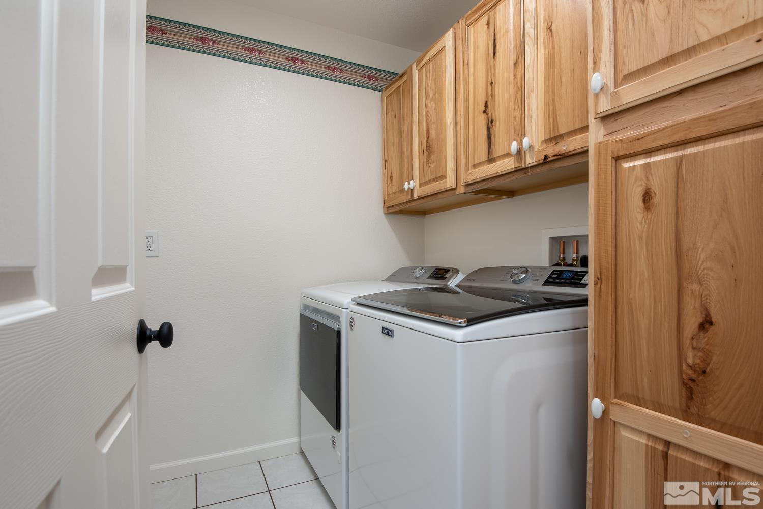 4651 Reds Grade Carson City, NV 89703 - Photo 21 of 39 a view of a storage and utility room with washer and dryer