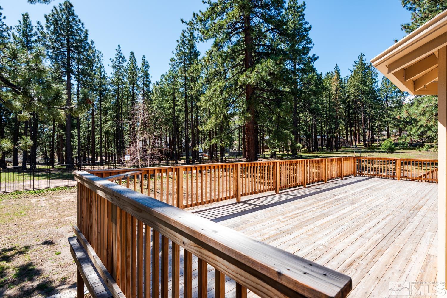 4651 Reds Grade Carson City, NV 89703 - Photo 30 of 39 a view of balcony with wooden floor and fence