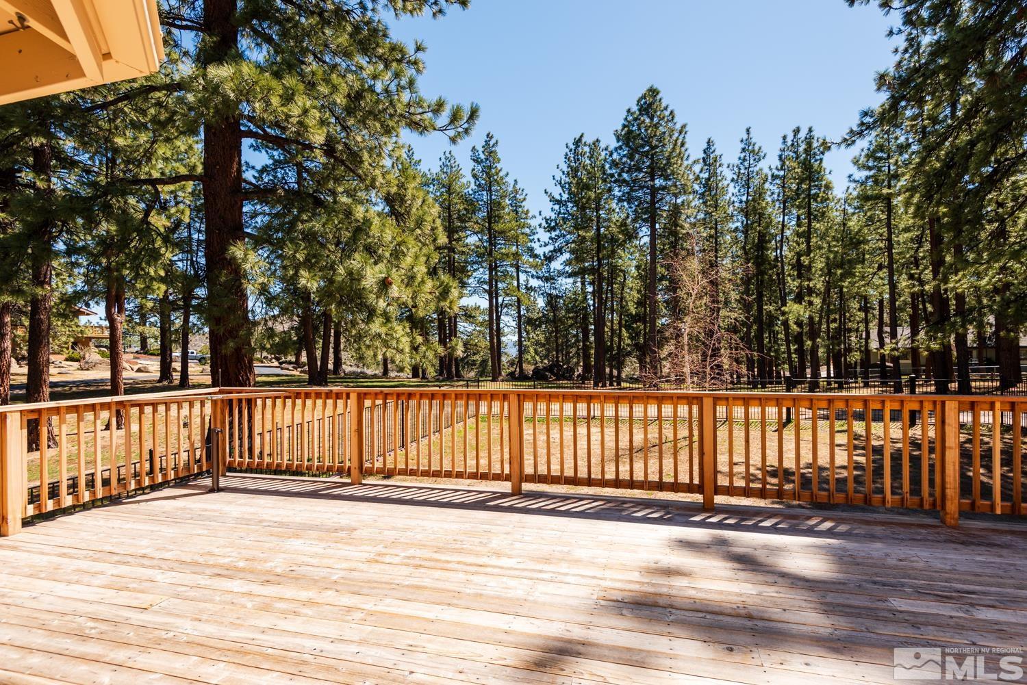 4651 Reds Grade Carson City, NV 89703 - Photo 31 of 39 a view of a deck with a trees