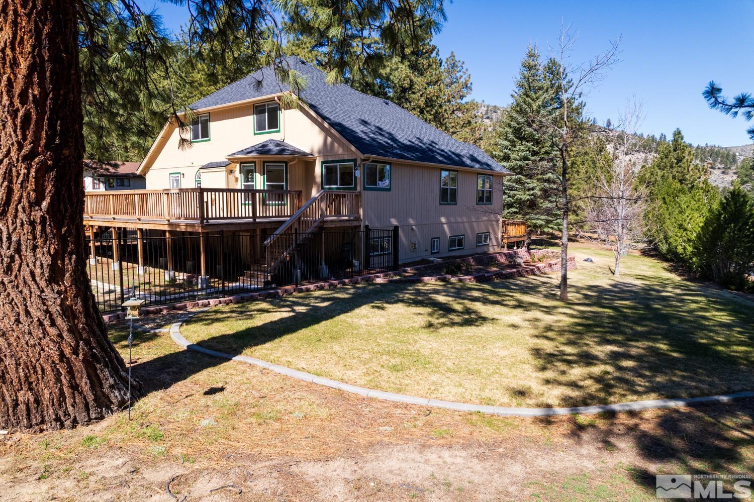 4651 Reds Grade Carson City, NV 89703 - Photo 33 of 39 a view of a house with swimming pool and sitting area