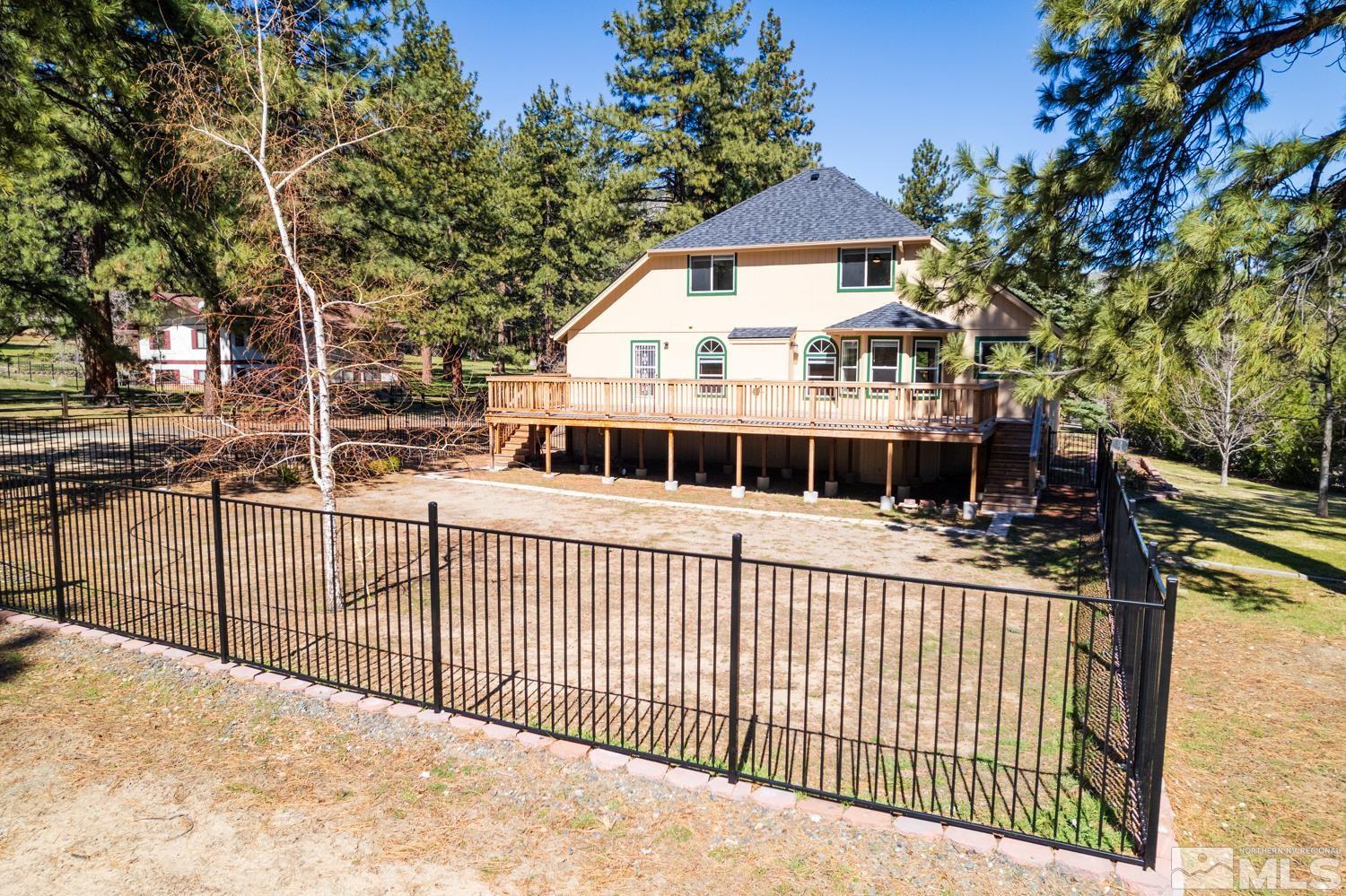 4651 Reds Grade Carson City, NV 89703 - Photo 35 of 39 a view of a house with wooden fence