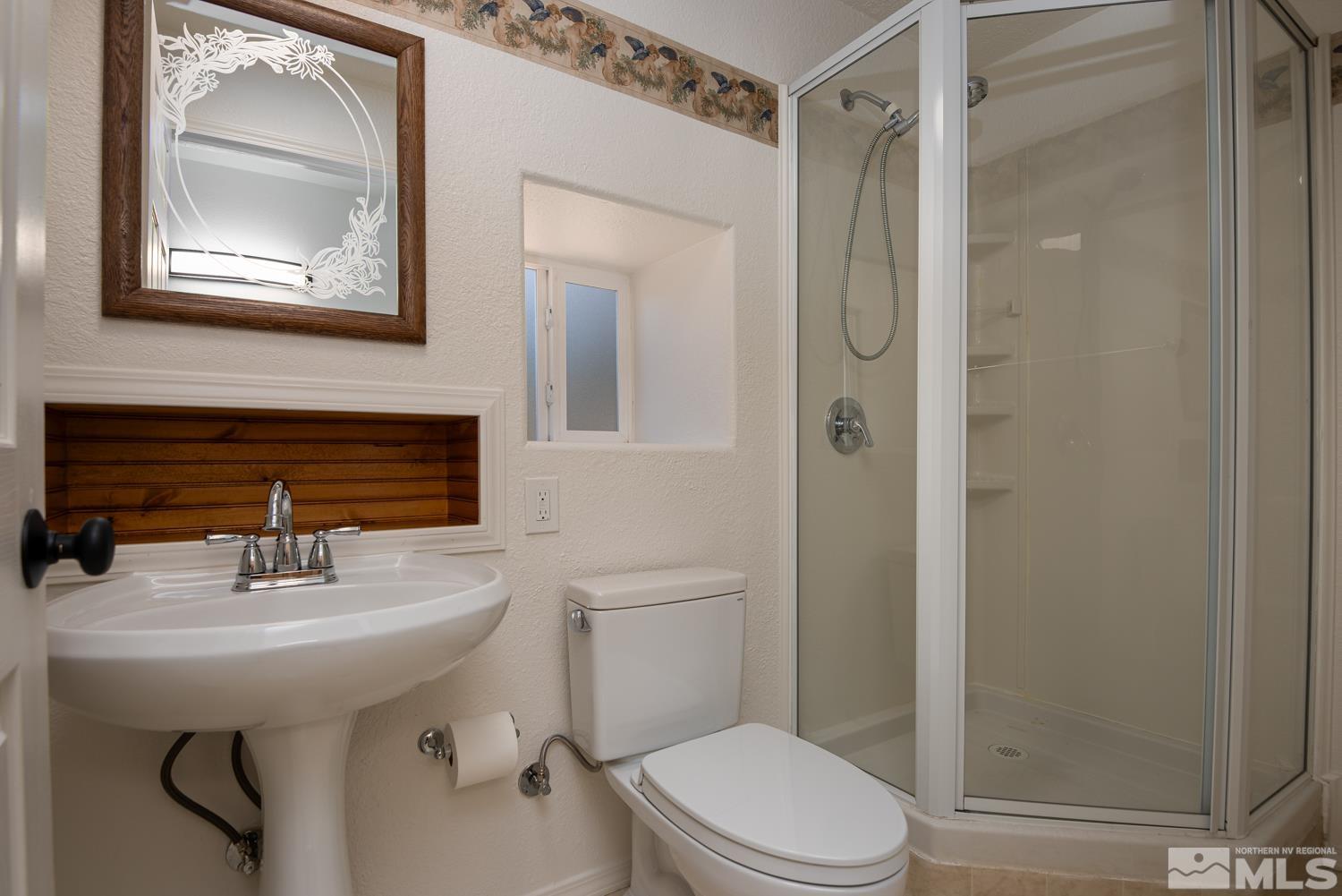 4651 Reds Grade Carson City, NV 89703 - Photo 36 of 39 a bathroom with a sink toilet and shower