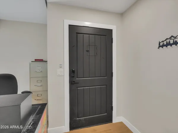 a view of kitchen with furniture and wooden floor