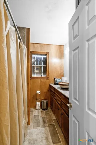 a kitchen with a stove and a refrigerator
