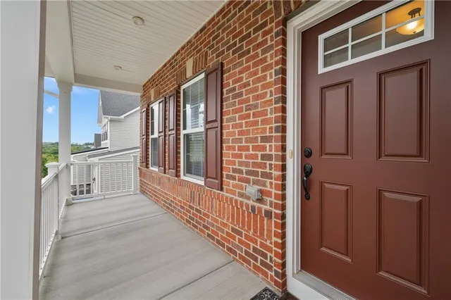 a view of a house with a large window