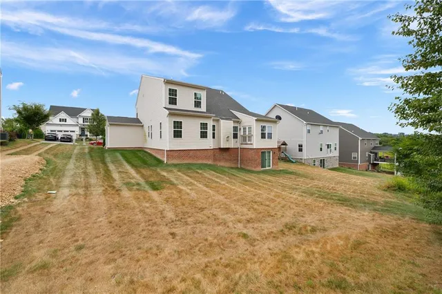 a house view with a garden space