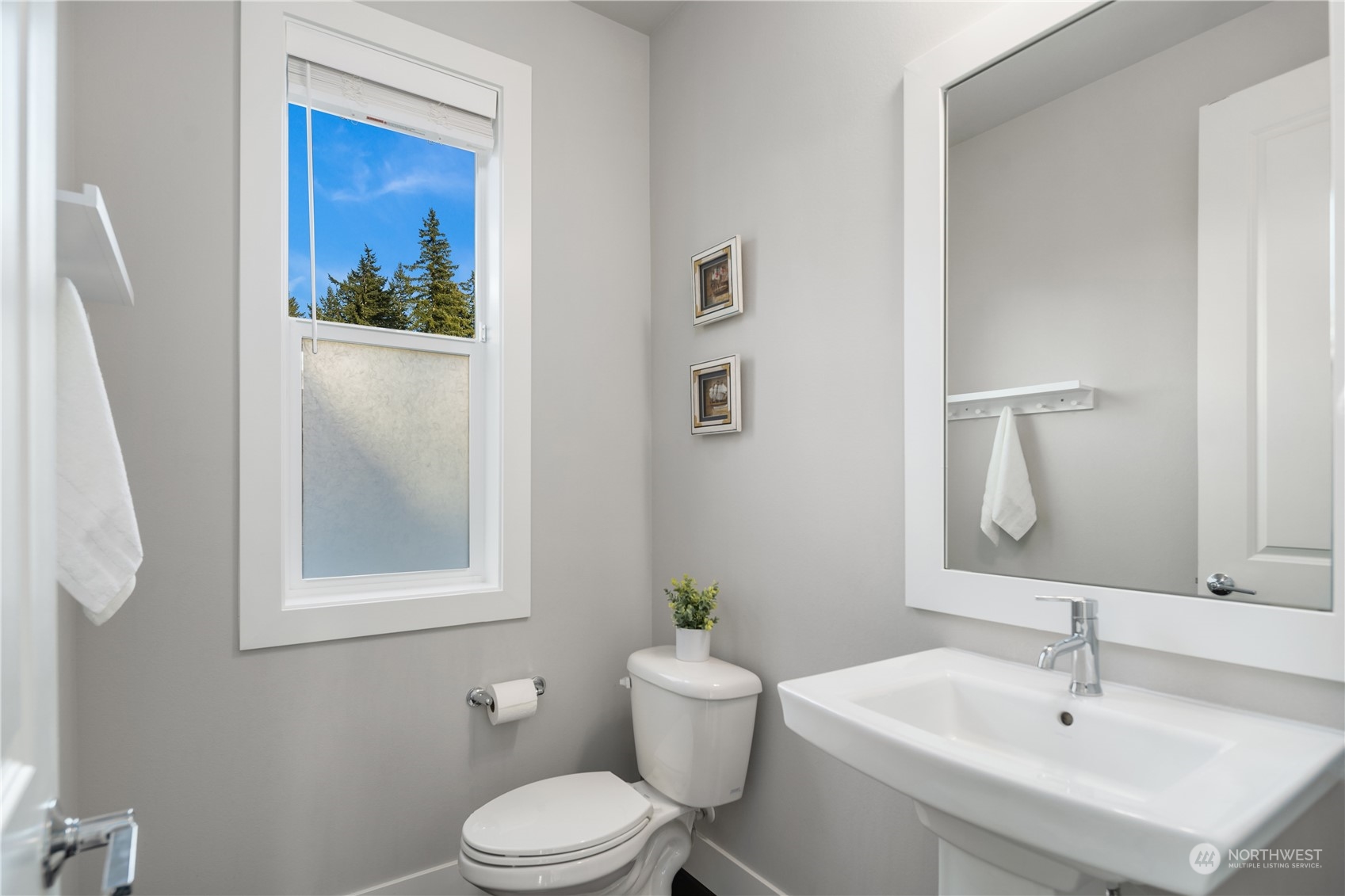 4312 224th Place Southeast Bothell, WA 98021 - Photo 17 of 40 a bathroom with a toilet sink and mirror