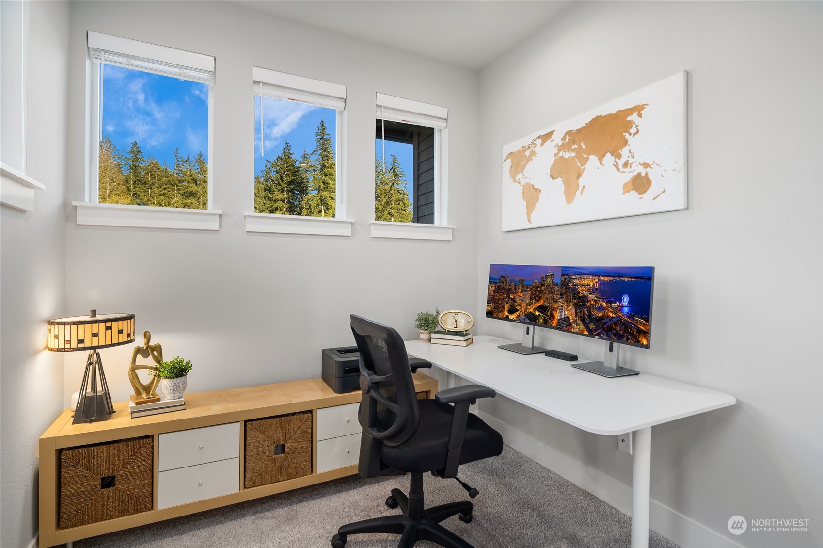 4312 224th Place Southeast Bothell, WA 98021 - Photo 26 of 40 a view of a workspace with furniture and wooden floor