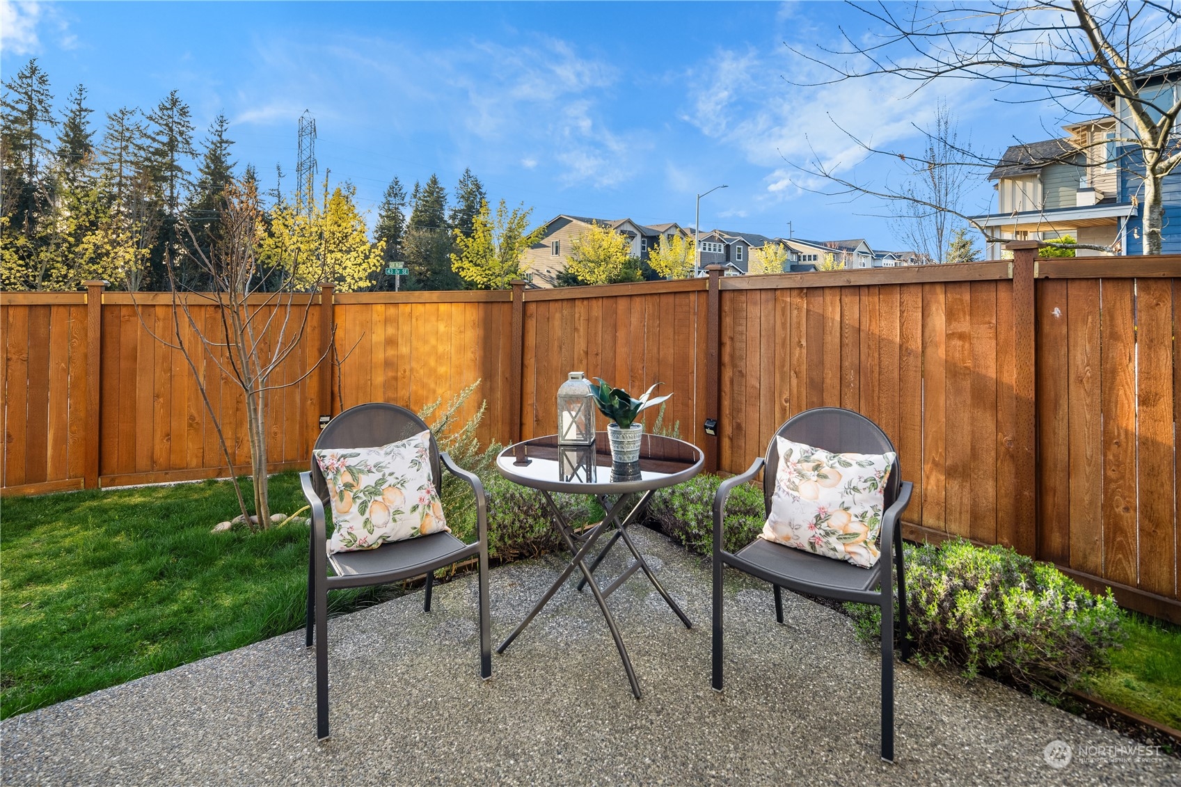 4312 224th Place Southeast Bothell, WA 98021 - Photo 29 of 40 a backyard of a house with table and chairs