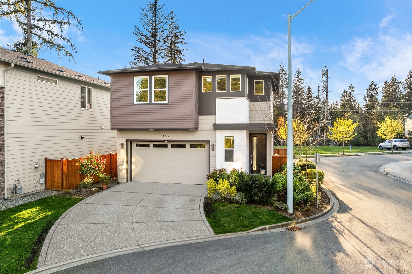 4312 224th Place Southeast Bothell, WA 98021 - Photo 31 of 40 a front view of a house with garden