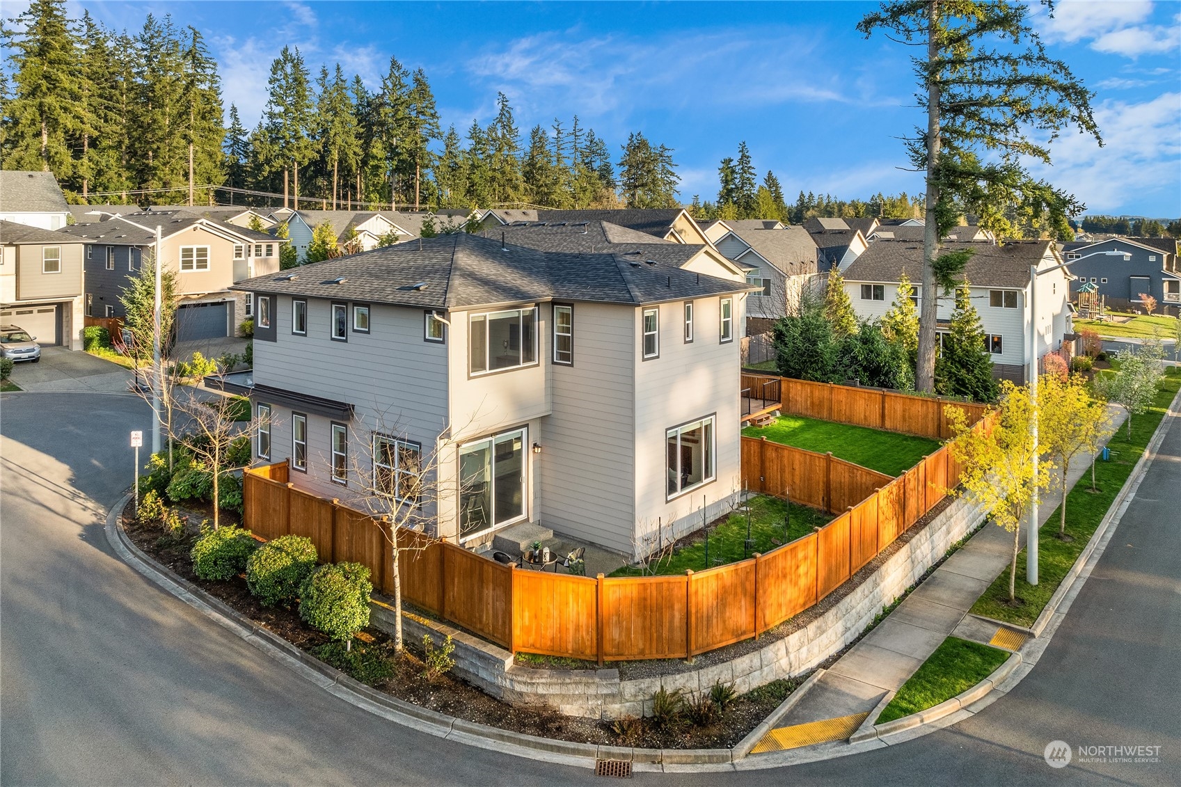 4312 224th Place Southeast Bothell, WA 98021 - Photo 32 of 40 a view of a house with a swimming pool