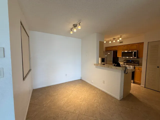 a view of kitchen and windows