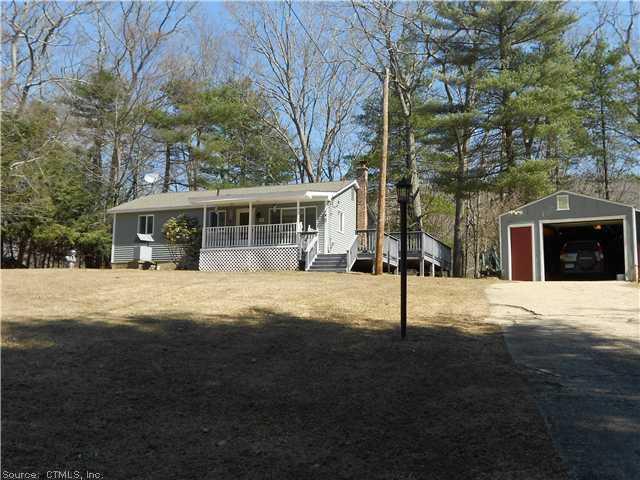 Exterior Front. Front view of L-Shaped Ranch.