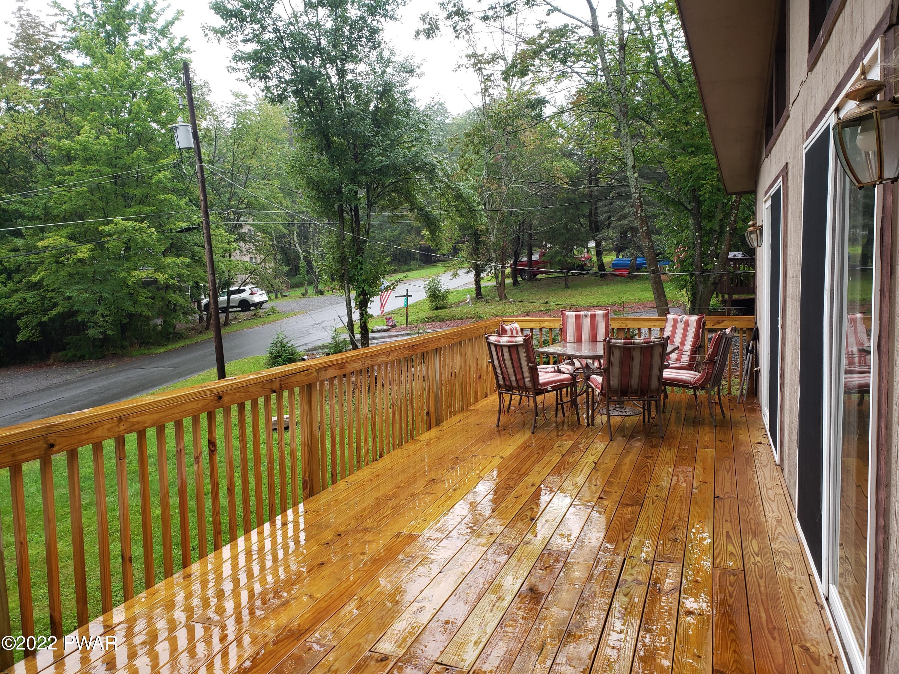 40 Crest View Road Lake Ariel, PA 18436 - Photo 18 of 32 a view of a chairs and table on the balcony