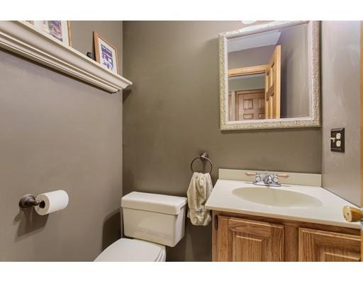 19 Justice Hill Road Sterling, MA 01564 - Photo 15 of 30 a bathroom with a sink a toilet and mirror