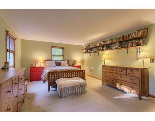 19 Justice Hill Road Sterling, MA 01564 - Photo 16 of 30 a bedroom with a bed and a night stand