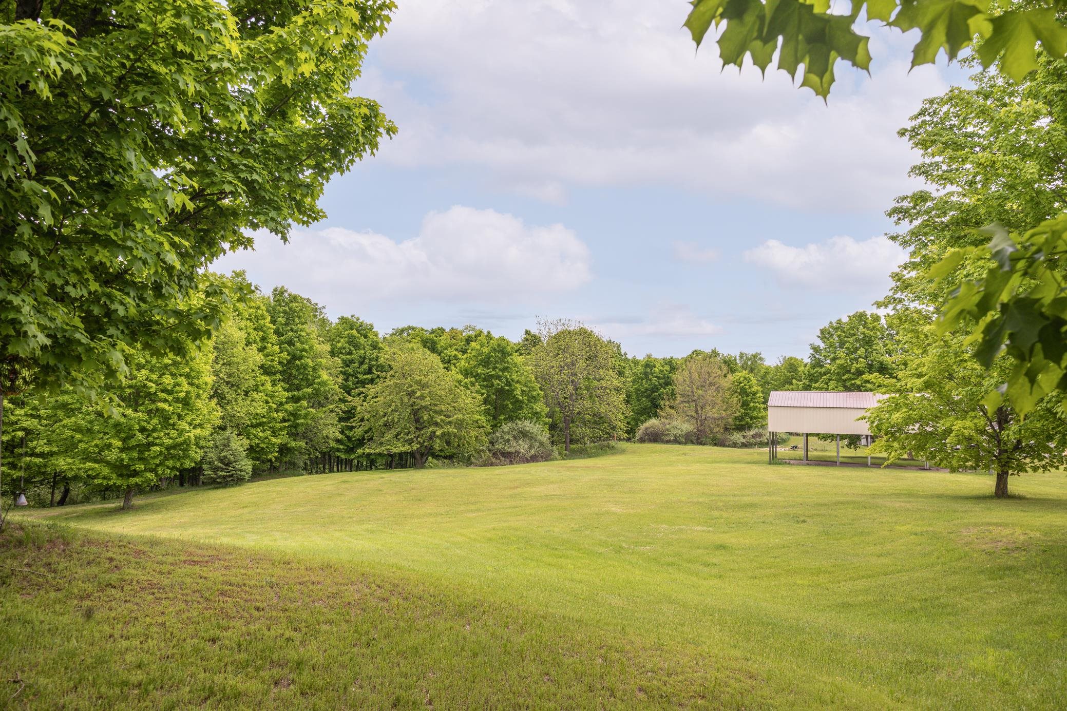 6921 Cram Road Williamsburg, MI 49690 - Photo 5 of 43