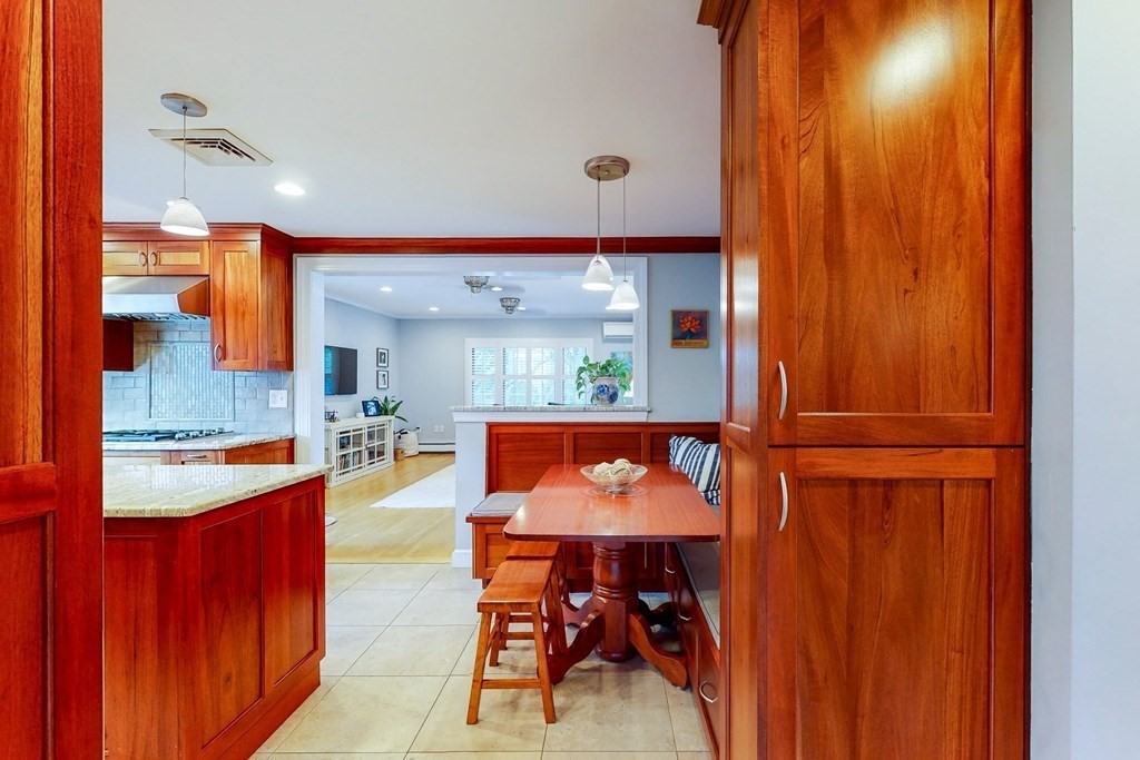 9 Mellen Street Needham, MA 02494 - Photo 12 of 42 a view of a kitchen and dining room