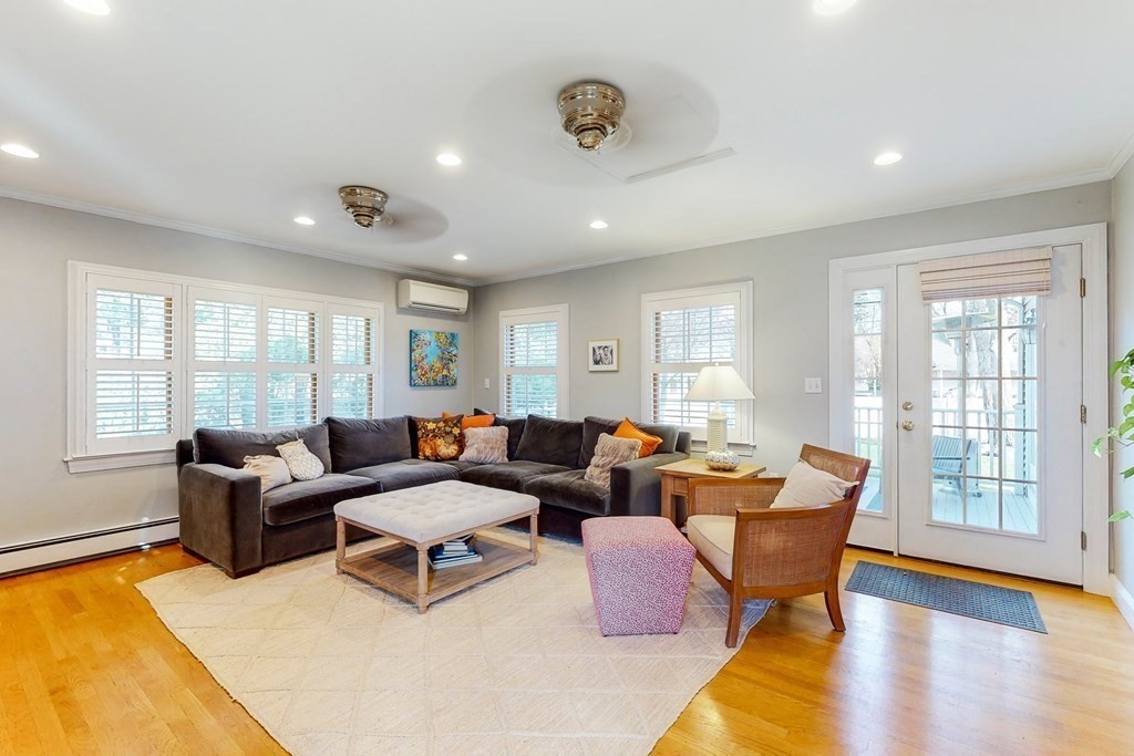 9 Mellen Street Needham, MA 02494 - Photo 19 of 42 a living room with furniture and wooden floor