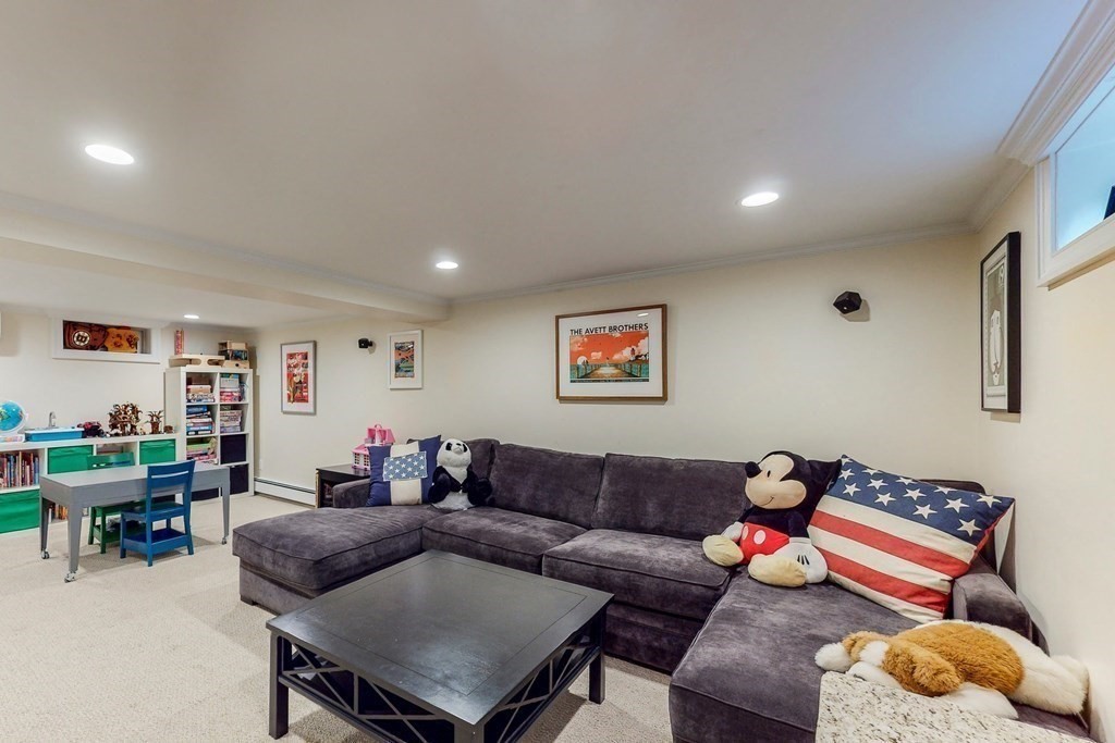 9 Mellen Street Needham, MA 02494 - Photo 32 of 42 a living room with furniture