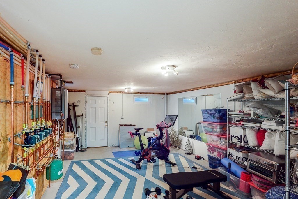 9 Mellen Street Needham, MA 02494 - Photo 36 of 42 a view of a room with gym equipment