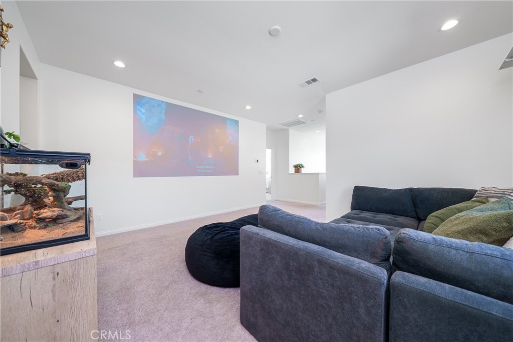 12829 Stags Leap Drive Riverside, CA 92503 - Photo 25 of 54 a living room with furniture and a couch