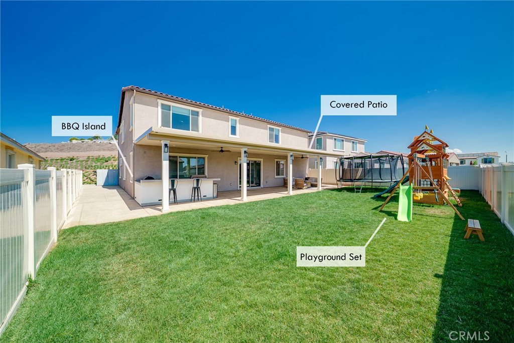 12829 Stags Leap Drive Riverside, CA 92503 - Photo 38 of 54 a view of a house with a big yard