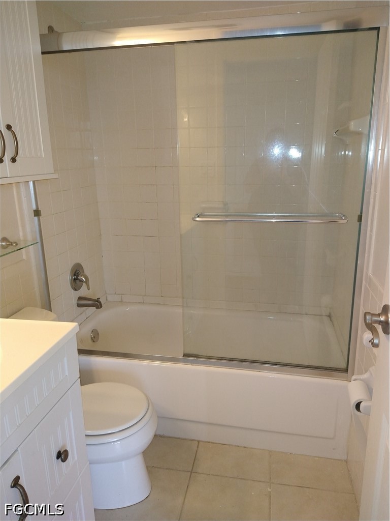2350 West First Street, Unit 603 Fort Myers, FL 33901 - Photo 16 of 17 a bathroom with a bathtub a toilet and a shower