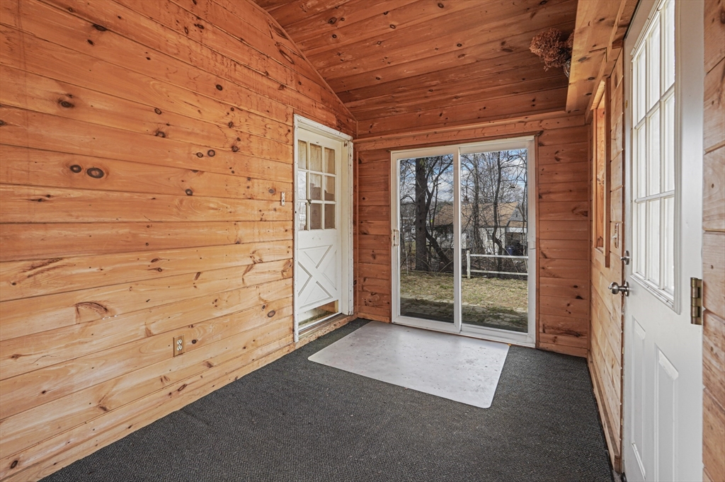 1459 Grafton Road Millbury, MA 01527 - Photo 19 of 42 a view of a porch with wooden floor and fence