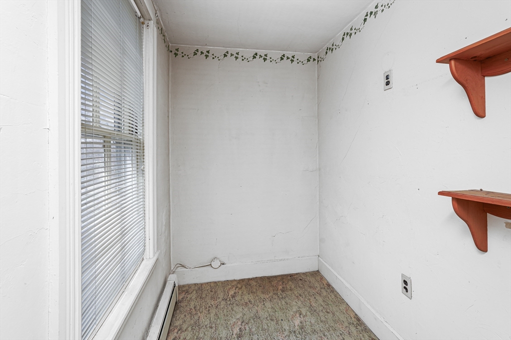 1459 Grafton Road Millbury, MA 01527 - Photo 24 of 42 a view of small space with racks on the wall
