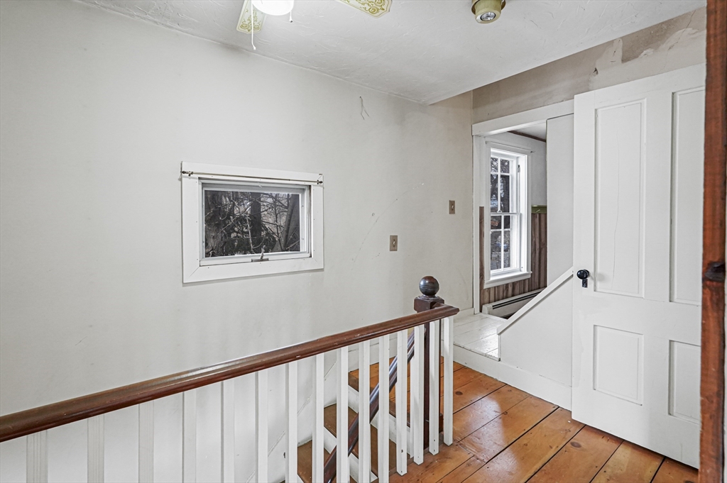 1459 Grafton Road Millbury, MA 01527 - Photo 25 of 42 a view of a hallway with windows