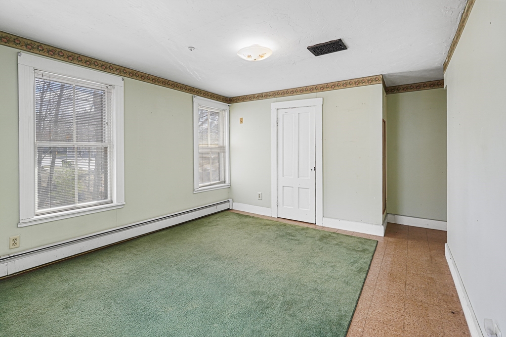 1459 Grafton Road Millbury, MA 01527 - Photo 29 of 42 an empty room with windows
