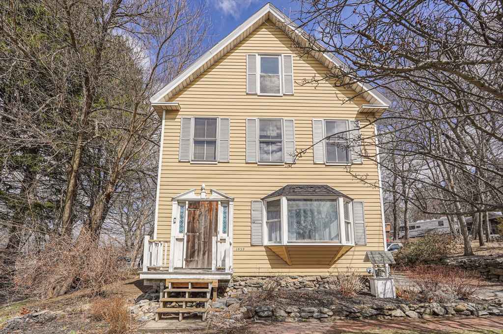 1459 Grafton Road Millbury, MA 01527 - Photo 3 of 42 a front view of a house