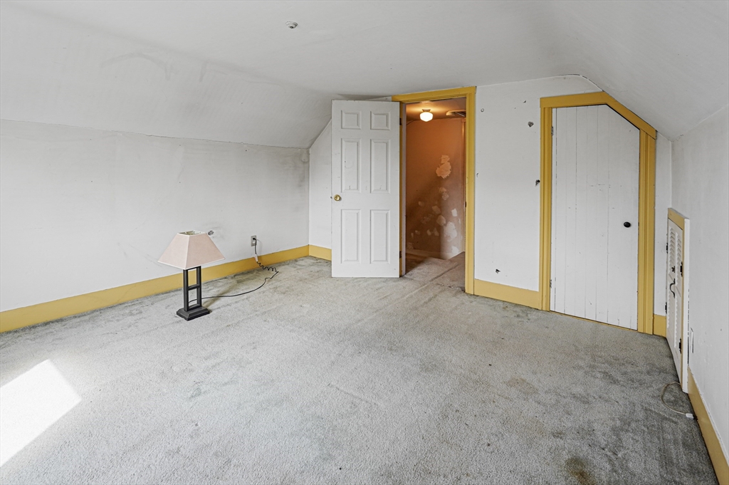 1459 Grafton Road Millbury, MA 01527 - Photo 37 of 42 an empty room with windows