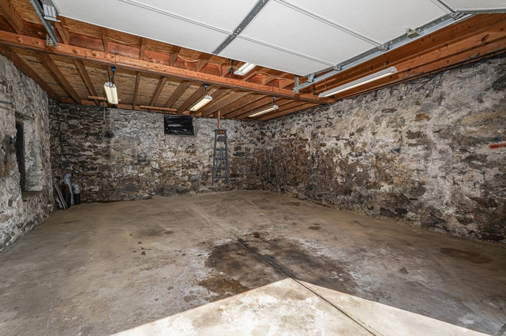 1459 Grafton Road Millbury, MA 01527 - Photo 38 of 42 a view of a room with wooden walls