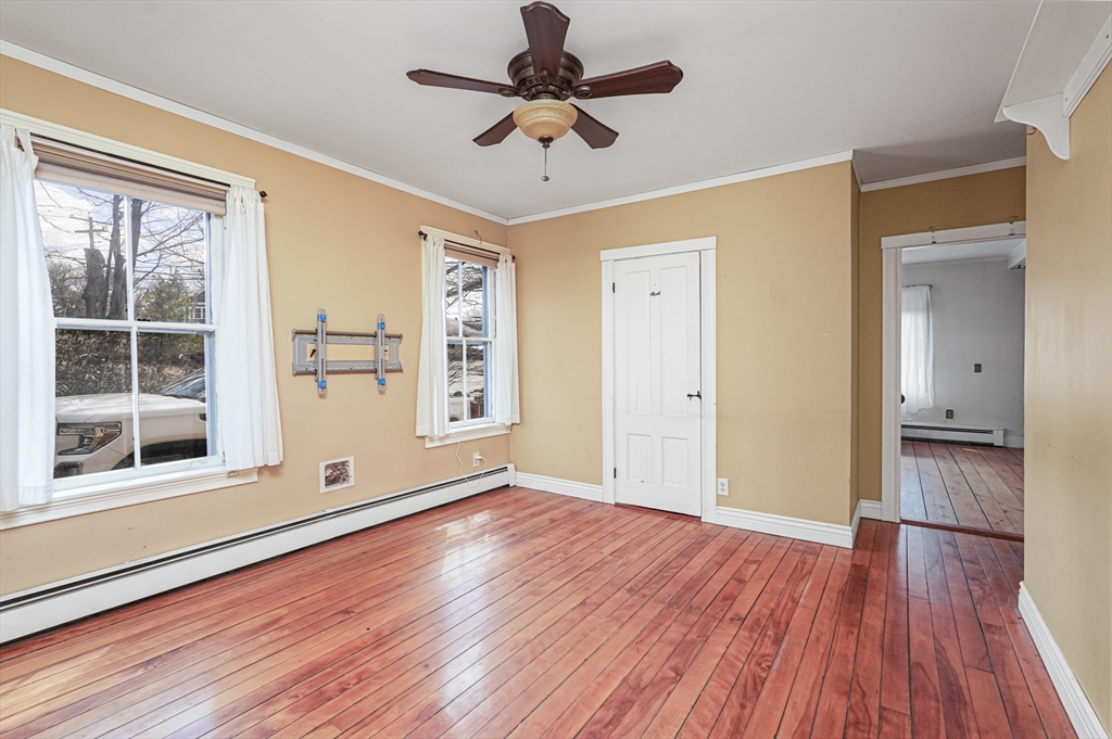 1459 Grafton Road Millbury, MA 01527 - Photo 9 of 42 wooden floor in an empty room with a window
