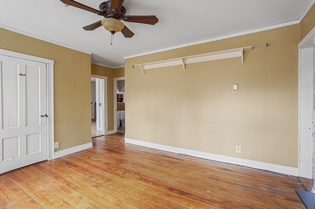 1459 Grafton Road Millbury, MA 01527 - Photo 10 of 42 a view of an empty room with wooden floor