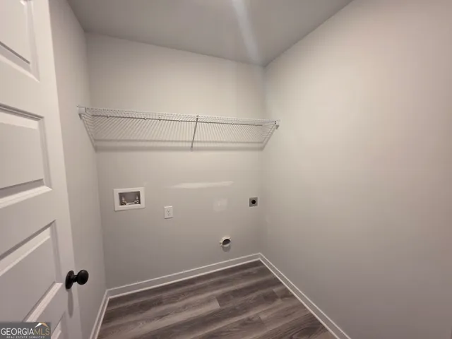 a view of a room with racks on the wall